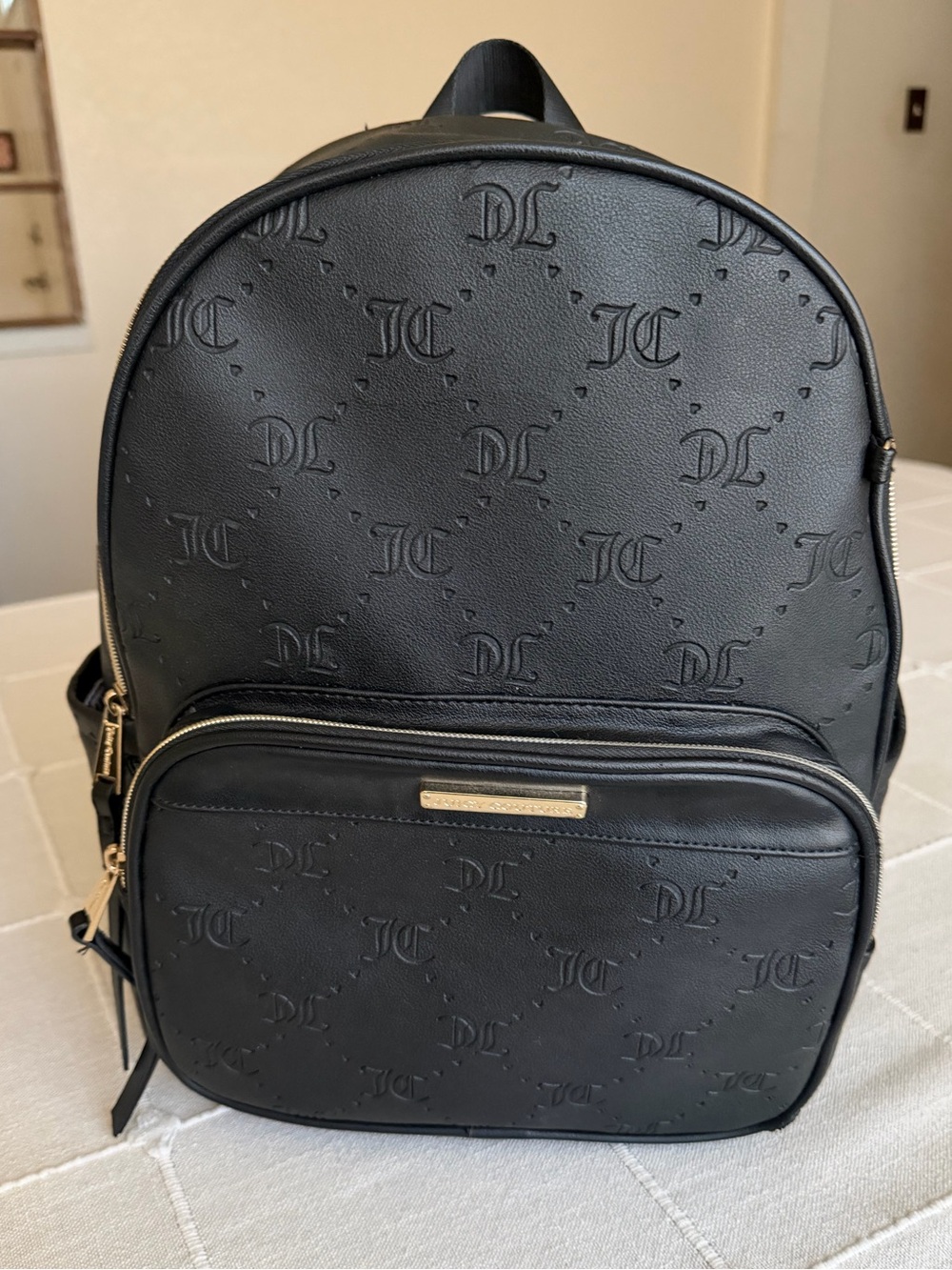 Juicy Couture Black Embossed Logo Backpack with Gold Hardware